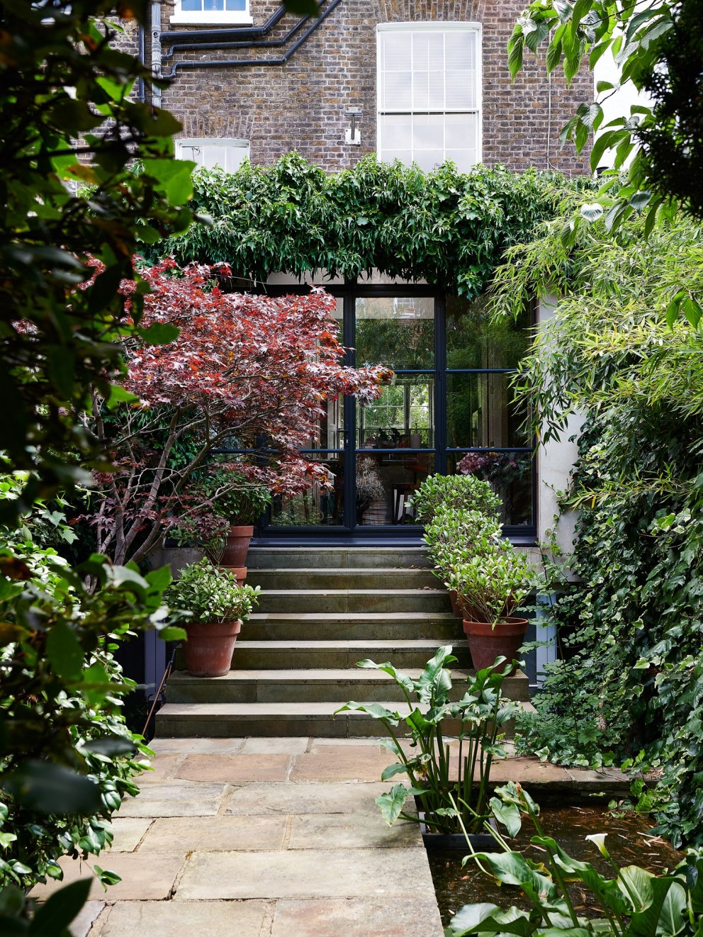 Notting Hill Town House  | Garden extension design  | Interior Designers